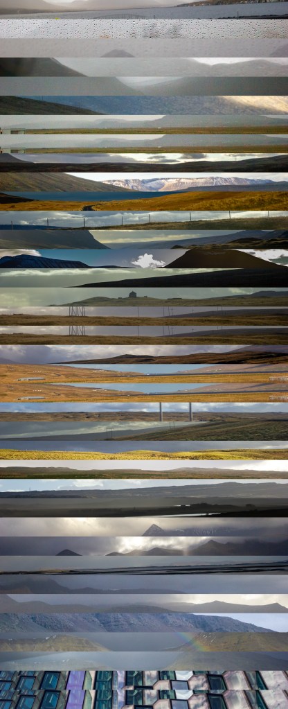A tall stack of 37 thin horizontal landscape strips. From the top: a grey fjord, rain on glass, brown moorland with pylons and fences, snow capped mountains, dark ridges under heavy cloud, and at the bottom the glass facade of a building in Reykjavik.